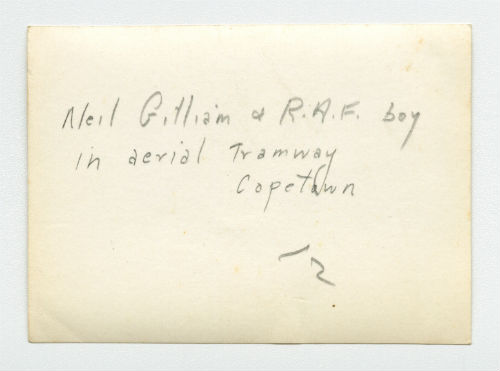 Neil Gilliam and an RAF boy on the aerial tram in Cape Town, South Africa. Verso