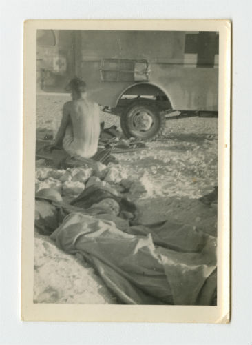 Arthur Howe, Jr. in his slit trench near Tobruk, Libya. Recto