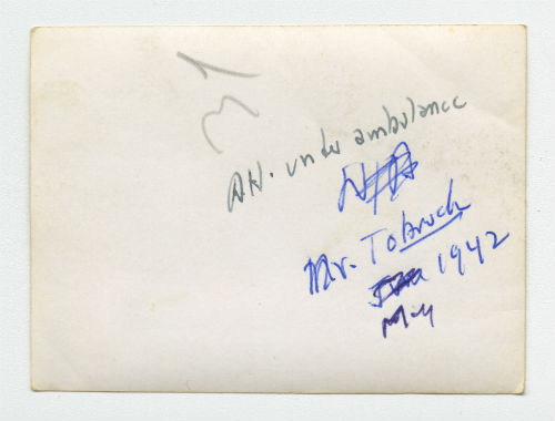 Arthur Howe, Jr. sleeping under an ambulance near Tobruk, Libya. Verso