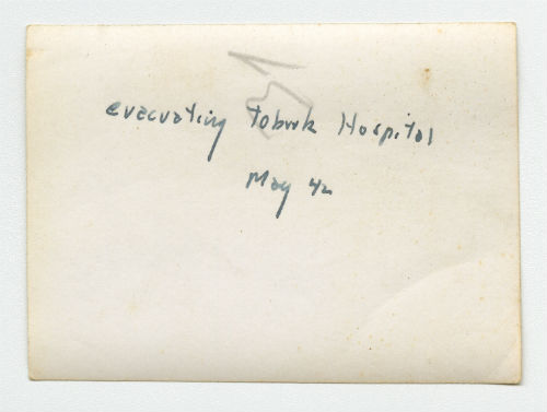 Evacuating Tobruk Hospital. Verso