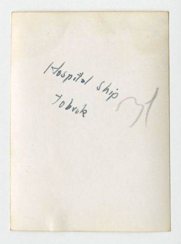Hospital ship off the coast of Tobruk, Libya. Verso
