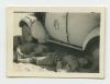 Arthur Howe, Jr. sleeping in the noon day sun. Recto