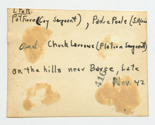 Erwin "Pat" Fiero, Padre Poole and Charles "Chuck" Larrowe on the hills near Barca, Libya. Verso