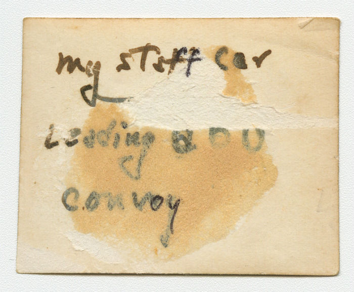 Arthur Howe, Jr.'s staff car leading a convoy. Verso