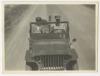 Charles Beach Powell and Edwin "Pat" Fiero following Arthur Howe Jr.'s car in convoy. Recto