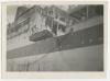 Loading the wounded onto a ship. Recto