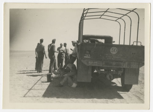 Midday lunch and practice run for desert navigation with a Chevrolet 3 ton truck. Recto