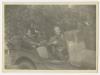 "Webby" and Charles "Charlie" Snead in an AFS jeep. Recto