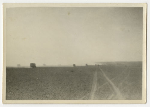 AFS company moves along in six columns across the endless desert in Tripolitania, Libya. Recto