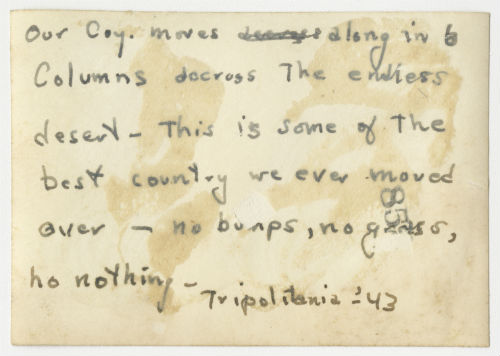 AFS company moves along in six columns across the endless desert in Tripolitania, Libya. Verso