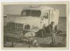 Land mine damage on an AFS ambulance. Recto