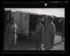 Three unidentified individuals with ambulances