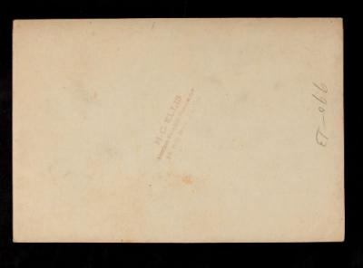 American Field Service ambulance 1052 with driver. Verso.