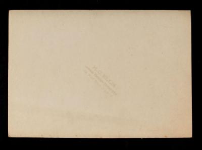 American Field Service ambulance 1004 with driver. Verso.