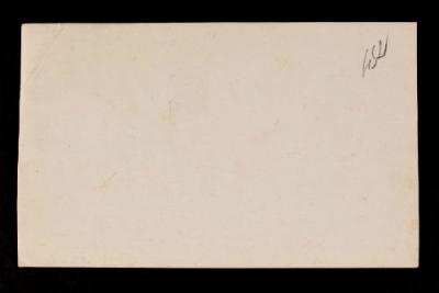 A. Piatt Andrew (turned away from the camera) speaking with unidentified individuals. Verso.