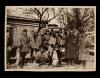 A Piatt Andrew (center) with ambulance drivers and officers