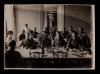 A. Piatt Andrew and AFS men in dining hall at 21 rue Raynouard
